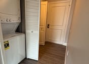 Thumbnail 18 of 18 - a small bathroom with a washer and dryer in it at Hidden Brook Apartment Homes Apartments, New Bedford, Massachusetts
