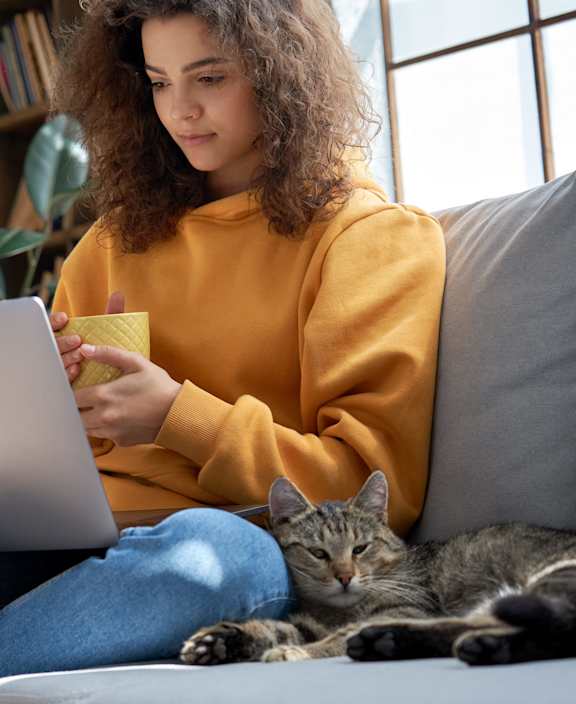 stock photo happy couple with a dog in their new home
