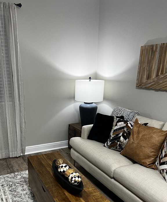 a view from above of a living room with a couch and a coffee table