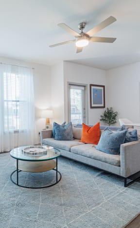a living room with a couch and a coffee table