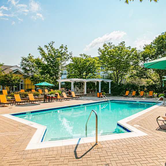Pool surrounded by chairs3 at Broadlands Apartments, Virginia