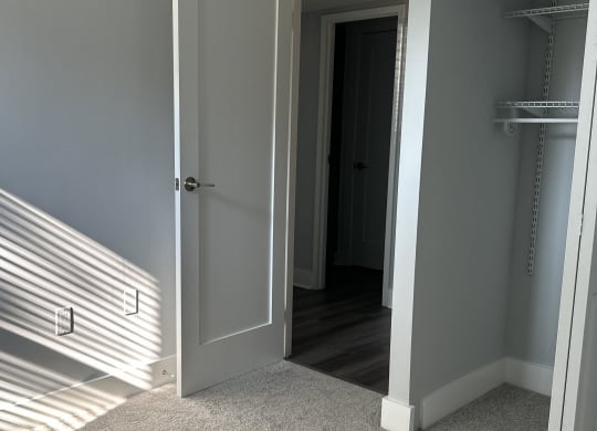 an overhead view of a closet with an open drawer