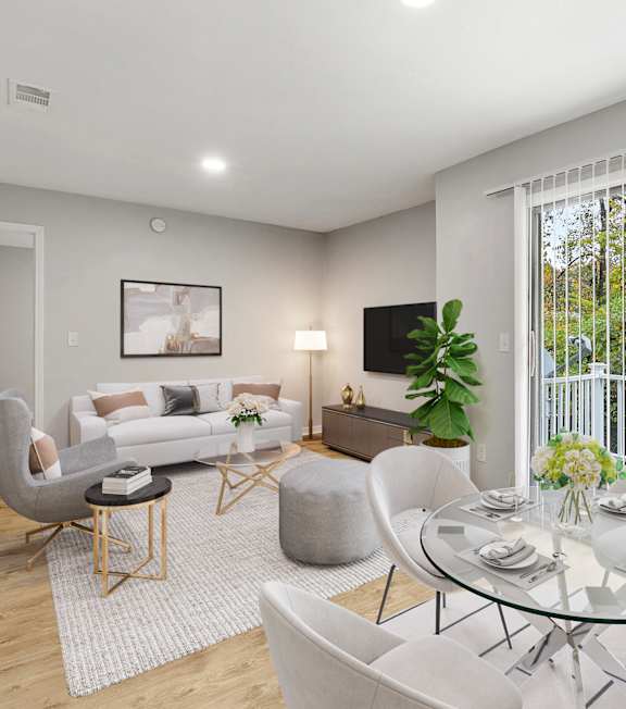 our apartments offer a living room with a couch and a tv at Woodbriar Management in GA, 30084