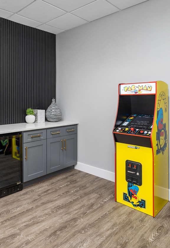 a room with consoles and other games
