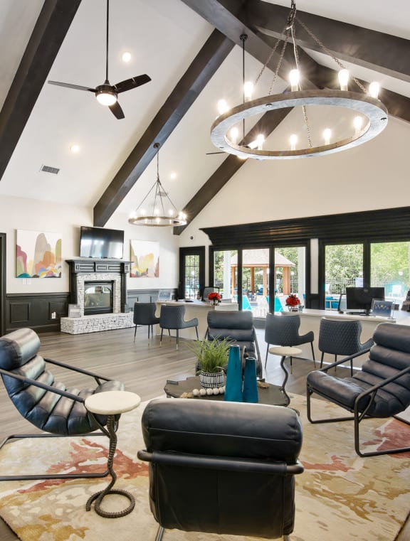 a large leasing office with couches and chairs at Columbus Apartments in Columbus, Georgia, GA