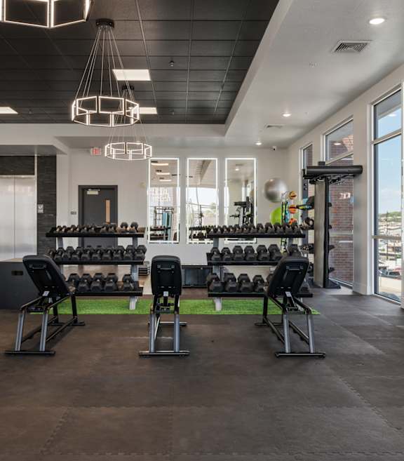 a gym with modern equipment 605 Place Student Housing & Co-Living, St George, UT 84770