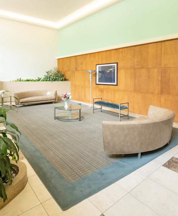 a living room with couches and a table