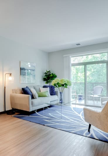 spacious living areas with vinyl flooring at Lake Jonathan Flats community