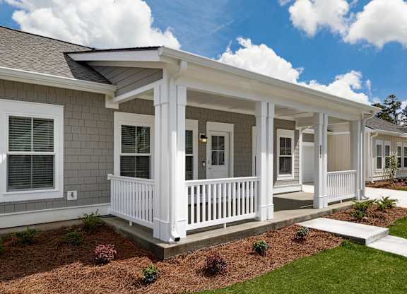 Allier home with front porch at Allier Port Wentworth Apartments, Port Wentworth, Georgia