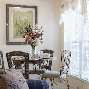 A breakfast dining table at Hawthorne Apartment Homes, set for a cozy and inviting meal.