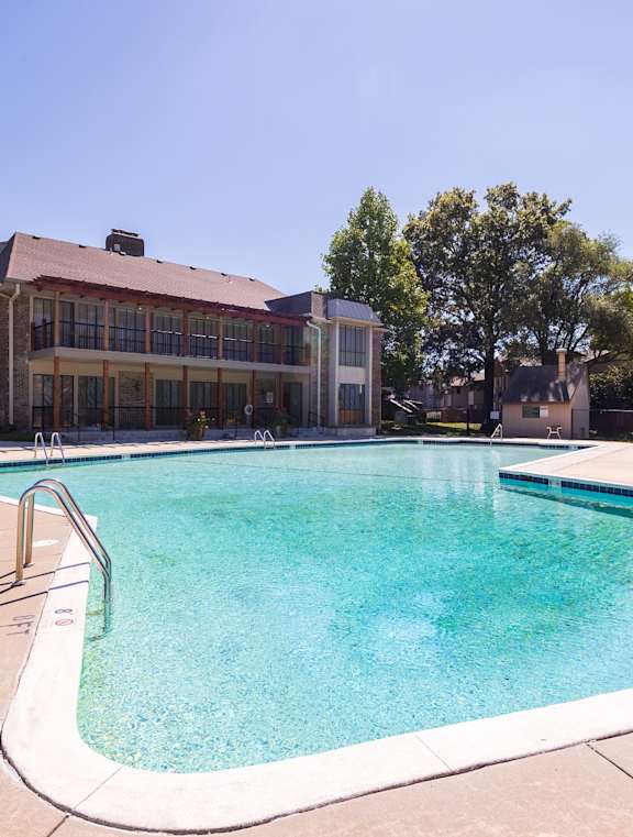 A spacious swimming pool area at Regent’s Walk Apartment Homes, ideal for unwinding.