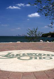 A round doormat with the words "Lakewood Ohio" written on it.