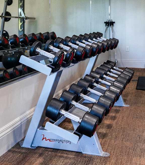 Free Weights in Gym at Four Seasons Apartments & Townhomes