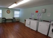 Thumbnail 4 of 10 - Laundry Center at Rendant Apartments
