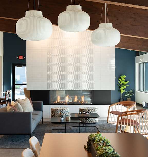 Clubhouse Living Area with Fireplace at The Bosk Apartment Homes, Woodbury, MN