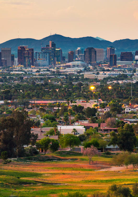 a view of the city at dusk at Connect on Missour Apartments, Phoenix 85015