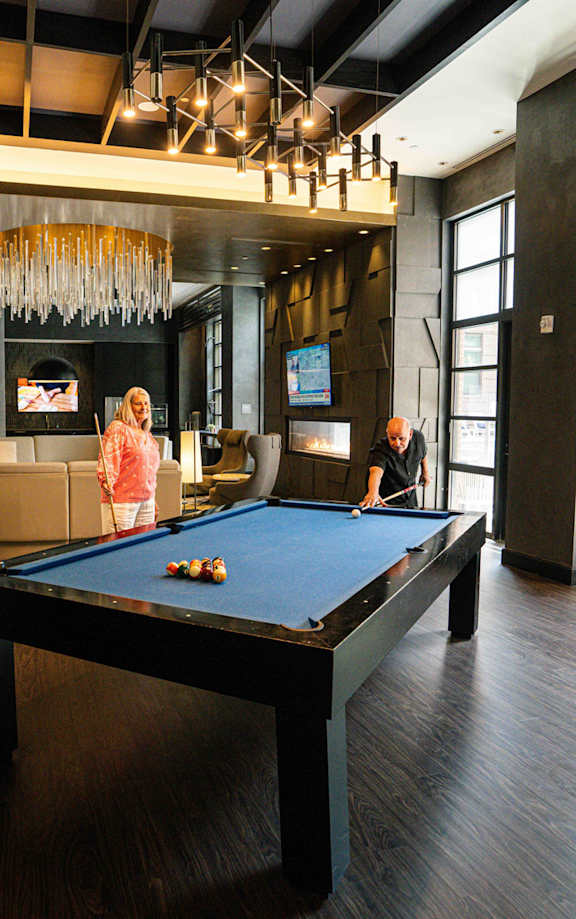 Couple playing pool