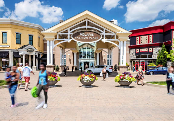 people walking in front of the polo lands casino house