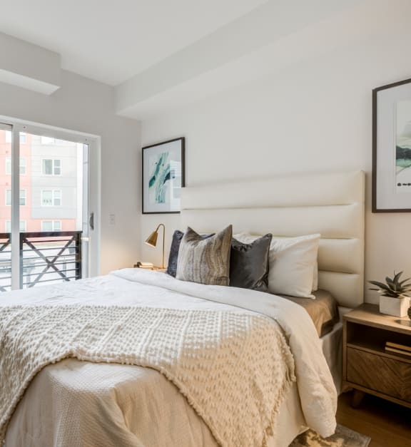 Rialto Apartments Model Bedroom with Private Balcony
