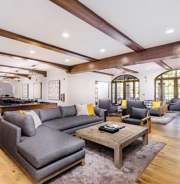 a living room with furniture and large windows  at Mission Hills, California, 93012
