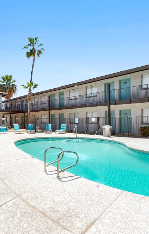 Outdoor poolside lounge at Riverton Apartments