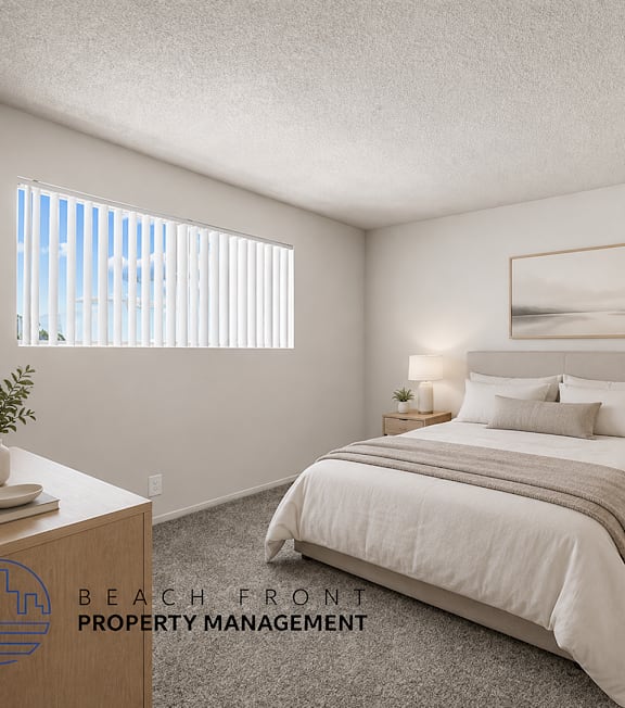 A bedroom with a bed, nightstands, and a window with blinds.