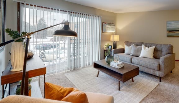 a living room with a couch and a coffee table