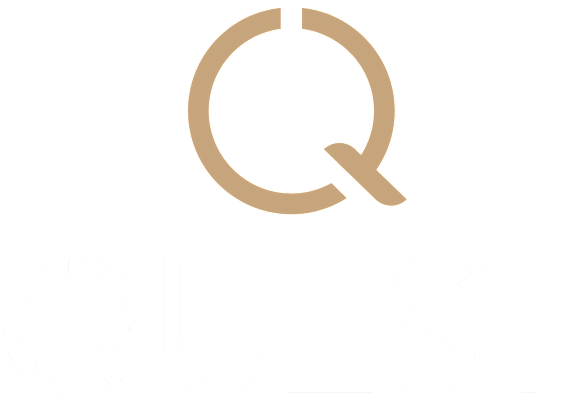 A logo with a circle and the word "QUEST" below it.