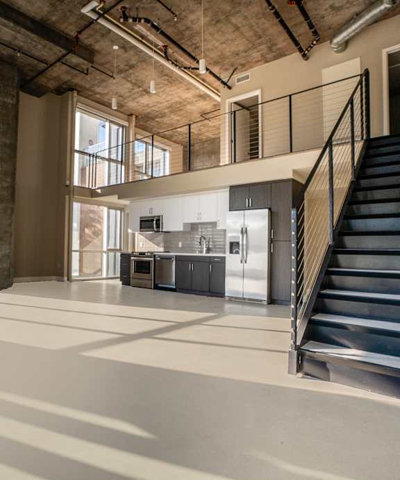 model loft floor plan with second story and open kitchen