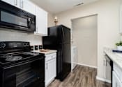 Thumbnail 4 of 29 - Black Appliances with White Cabinetry at Signal Mountain in Chattanooga, TN 37405