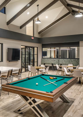 the reserve at bucklin hill clubhouse with pool table and bar