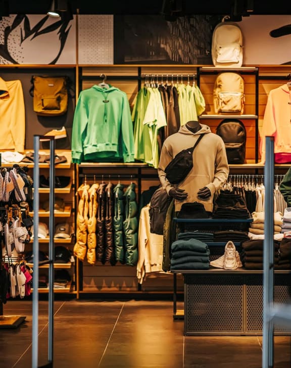 a clothing store with a lot of clothes on display