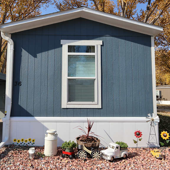 a blue shed with a window on the side of it at Circle Park, Cheyenne, Wyoming