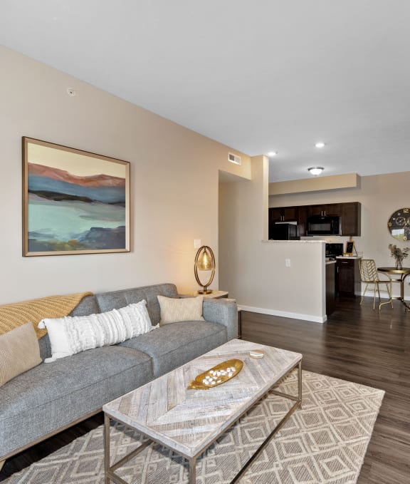 a living room with a couch and a table at Parkway Trails, Florence, KY, 41042