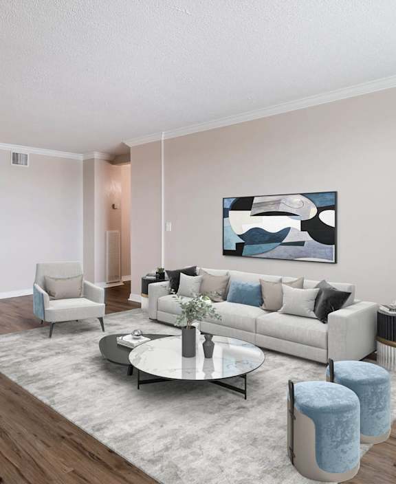 A living room with a blue table and a white couch.