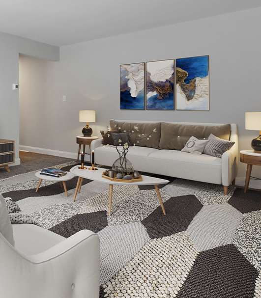 a living room with white couches and chairs and a large rug at Padonia Village Apartments, Timonium, MD