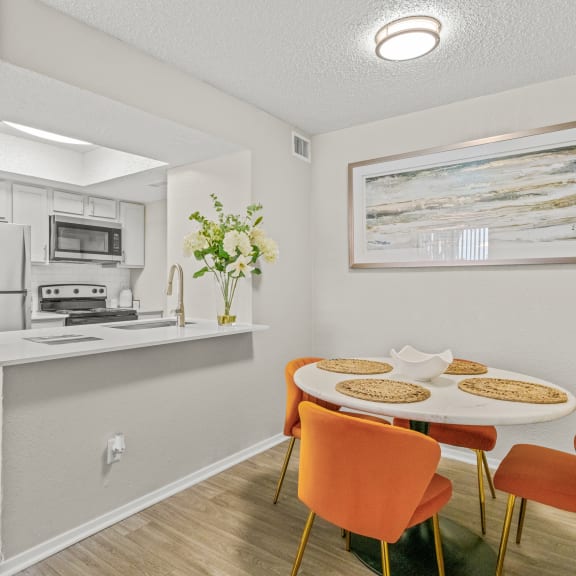 a kitchen with a sink and a refrigerator at District 2308, Arlington, TX 76011