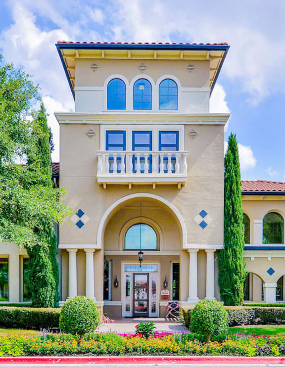 Entrance to leasing office at Mission at La Villita Apartments in Irving, TX offers 1, 2 & 3 bedroom apartment homes with appliances.