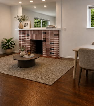 a view of the living room from the dining room table