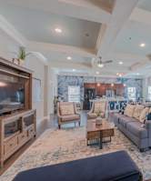 a kitchen with bar stools and an island
