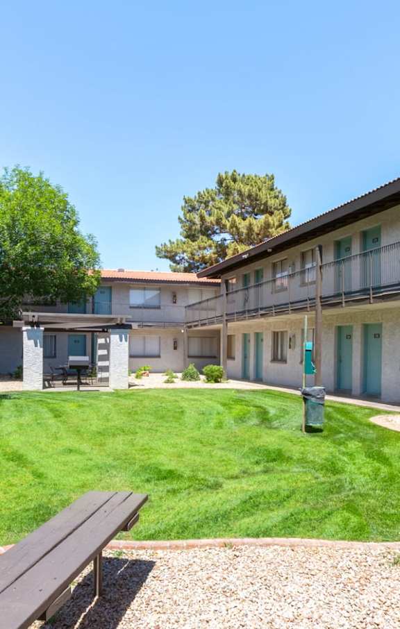 Outdoor poolside lounge at Riverton Apartments