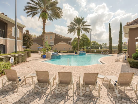 Community Pool with Lounge Chairs at Ballantrae Apartments, Sanford