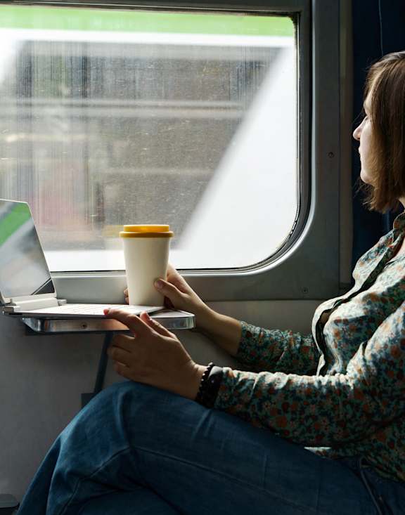 Girl Sitting A Train at 83-85 Silver Birch, California, M4E 3L2