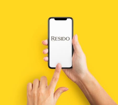 mobile phone with Resido resident app