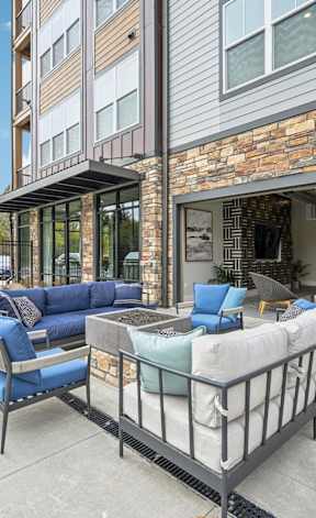 a lounge area with couches and chairs and tables at The Quarry Luxury Apartment Homes, Fort Collins, CO, 80526