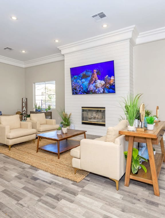a large living room with a kitchen and a dining room