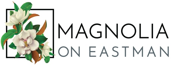 the magnolia on eastman logo