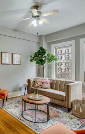 a living room with a couch and a chair