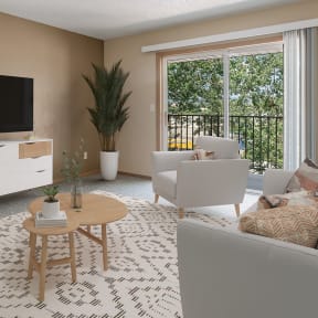 a living room with a white rug and a couch and a television