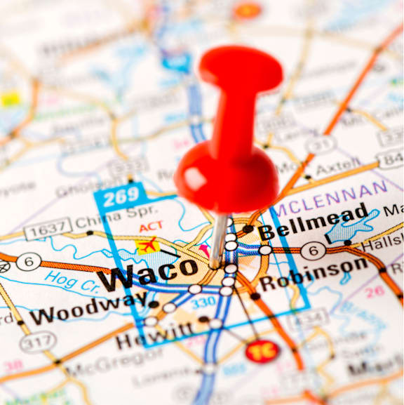 A map with a red pin marking a location.